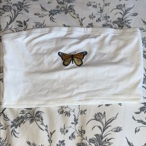white tube top with a butterfly stitching